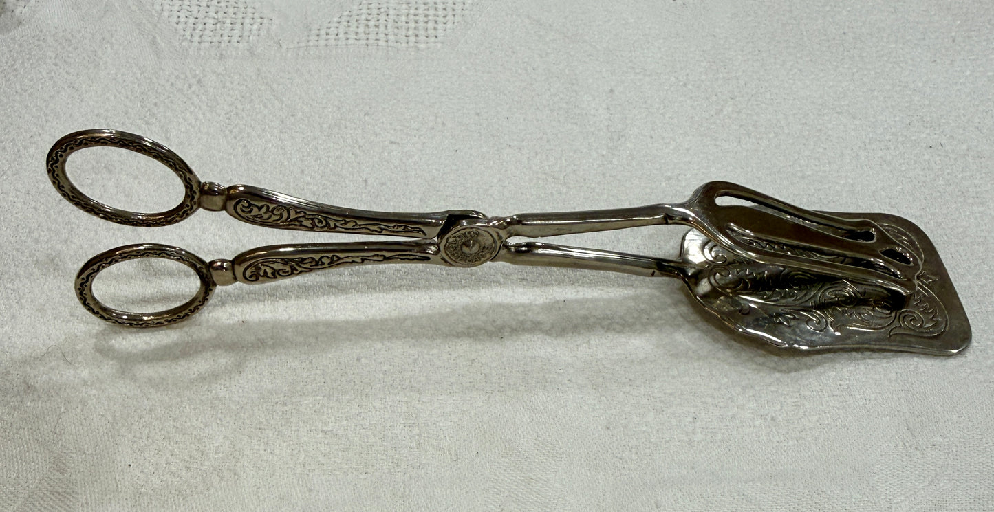 Pinza antigua plateada de servir con decoración grabada Silver Plate